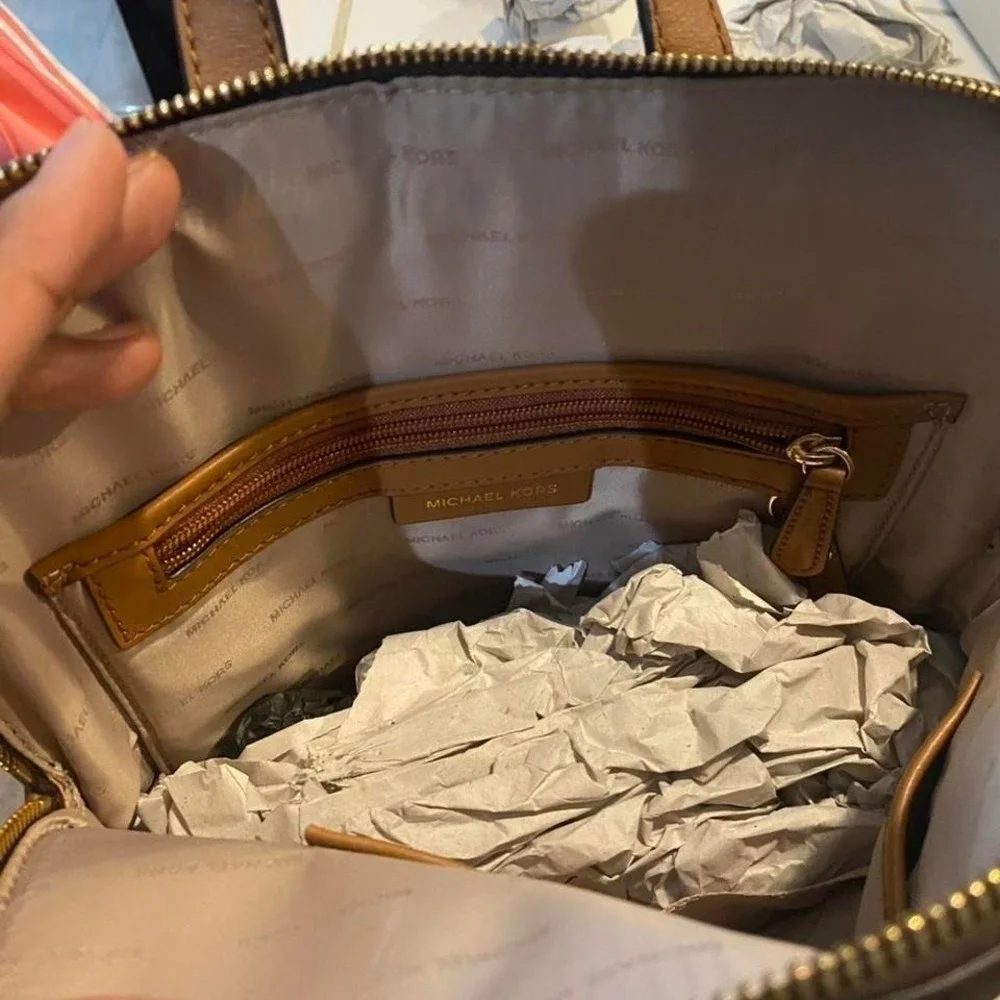 The Michael Kors Rhea Slim signature backpack
